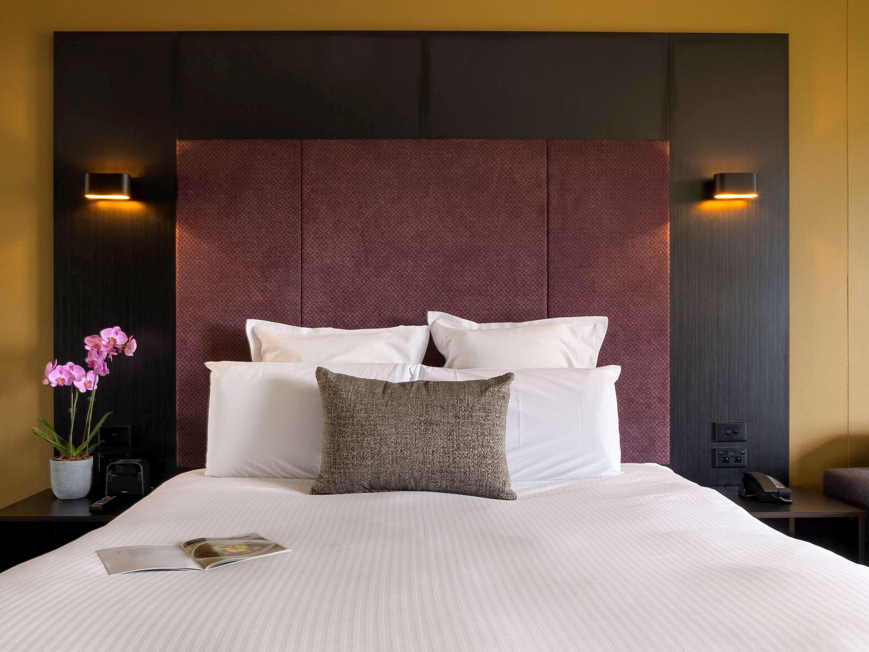 Hotel Pullman Sydney Hyde Park Exterior foto A bedroom at the hotel